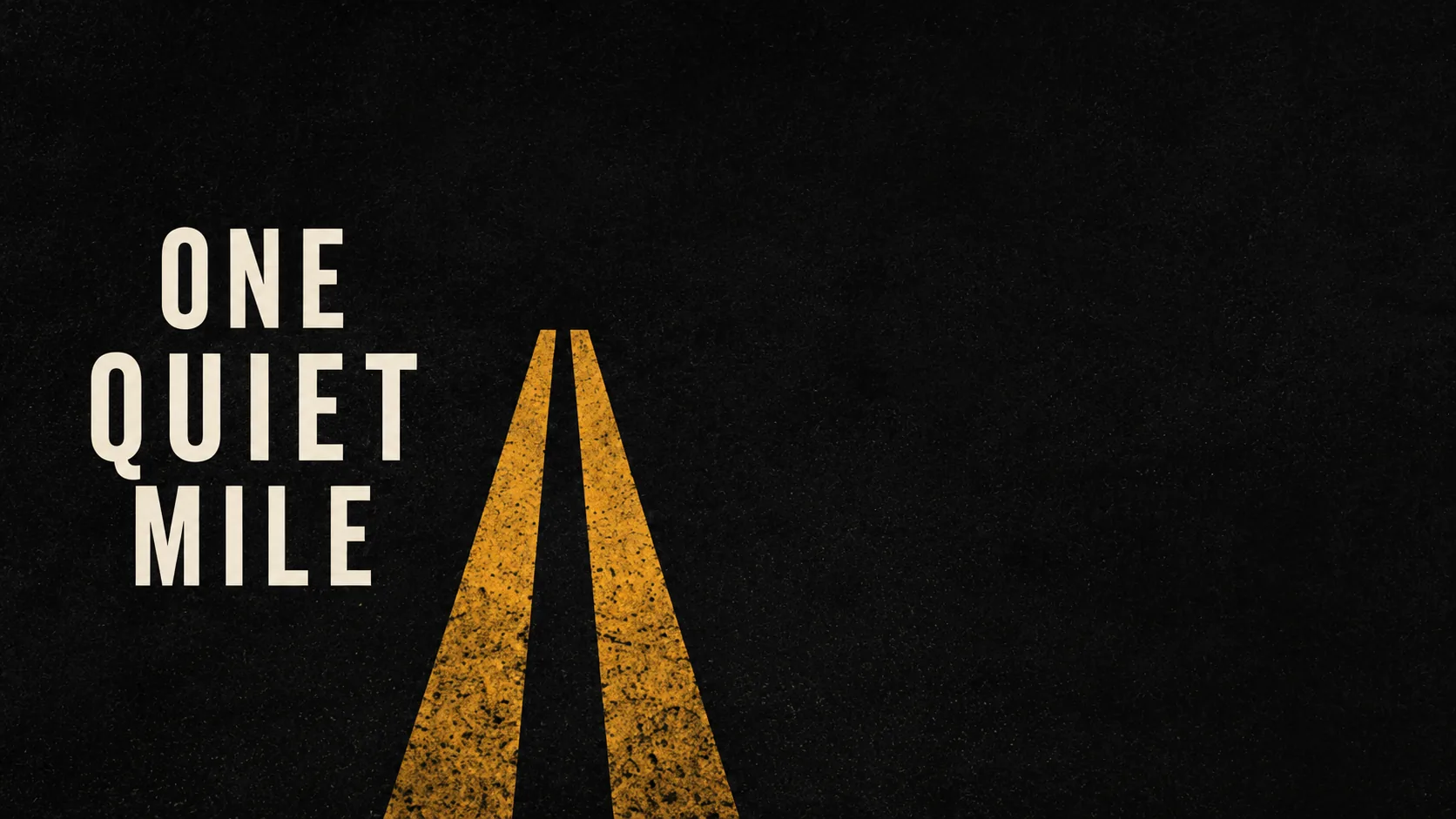 One Quiet Mile branding beside yellow road lines on blacktop